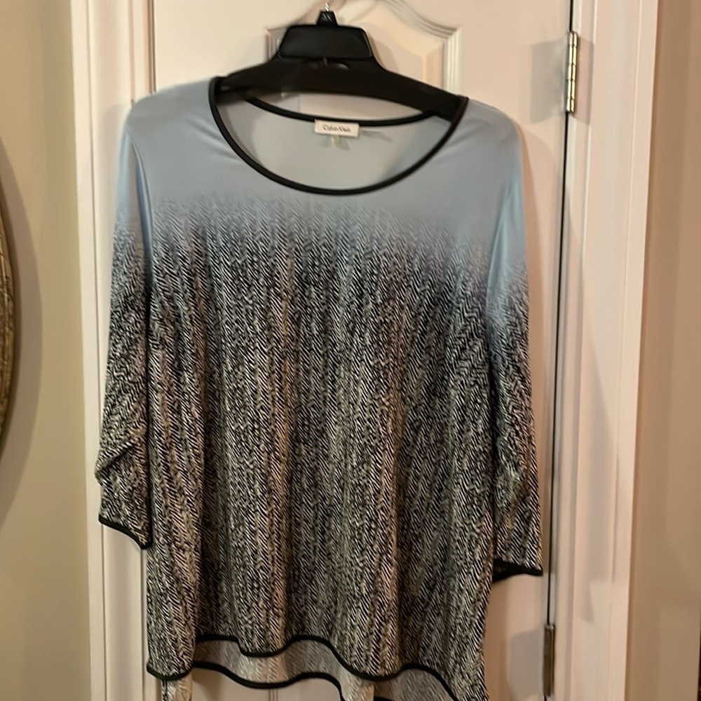 3X Calvin Klein top with light blue, black and ivory design.
